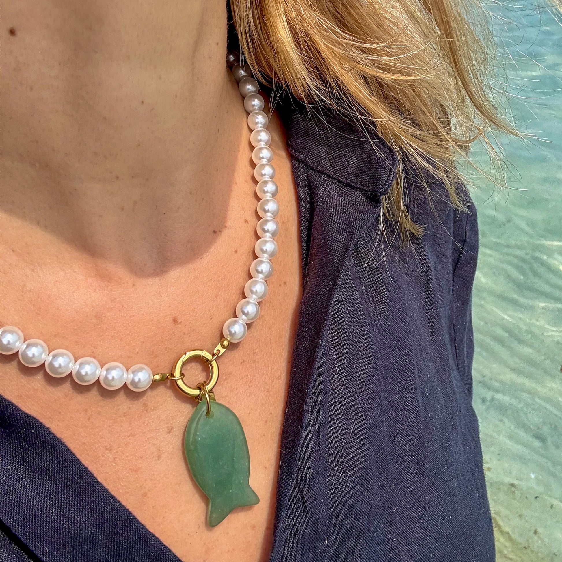 Pearl necklace with fish crystal pendant